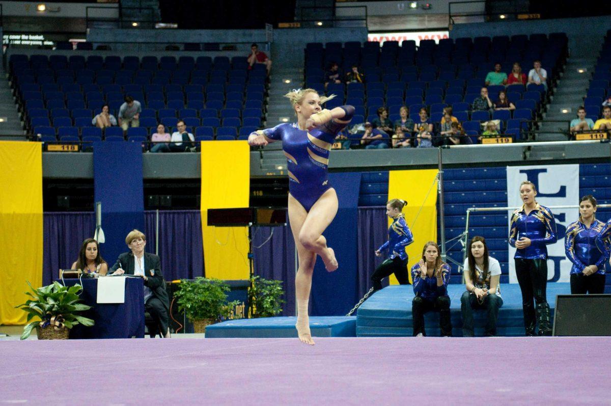 Freshman Kaleigh Dickson performs a routine on the floor during LSU&#8217;s win March 4 against New Hampshire.