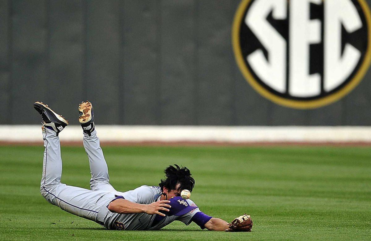 LSU junior outfielder Mikie Mahtook dives for a ball but fails to make a catch in the Tigers&#8217; April 22 loss to Vanderbilt, 11-3. LSU has lost eight of its last nine SEC games as it heads into a contest against Nicholls State.