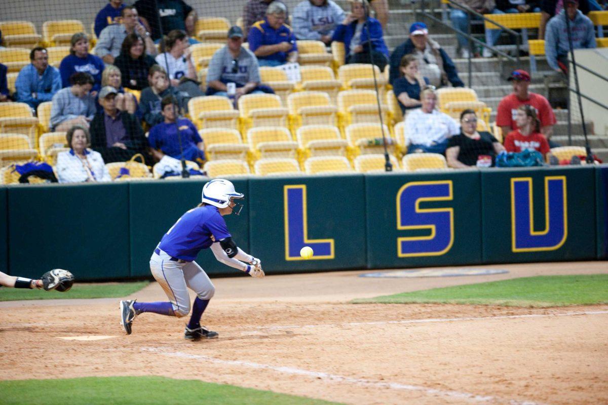 LSU senior utility player Tiffany Shaw bunts Wednesday during the TIgers&#8217; 8-0 win against Nicholls State. The Tigers have outscored the Colonels, 27-2, this season.