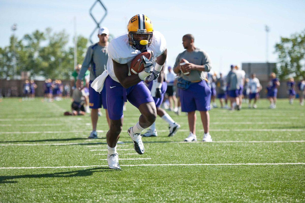 LSU sophomore running back Alfred Blue participates in drills during spring practice Tuesday. Four other backs join Blue in vying for the starting position.