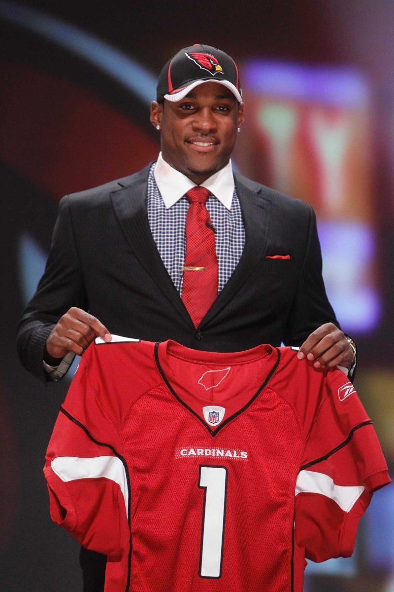 Former LSU cornerback Patrick Peterson holds up a jersey after he was selected as the fifth-overall pick by the Arizona Cardinals on Thursday in the first round of the NFL draft.