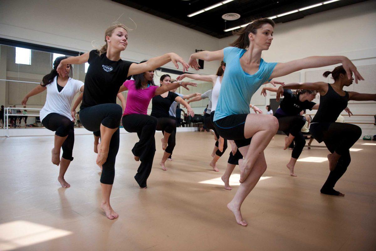 Rachel Klein (left), Carley Magette (right) and other LSU Dance Ensemble members practice &#8220;Hallelujah,&#8221; choreographed by Ali Manion to music by Paramore, on Wednesday. The LSU Dance Concert, featuring works by student choreographers, takes the stage Saturday at 7