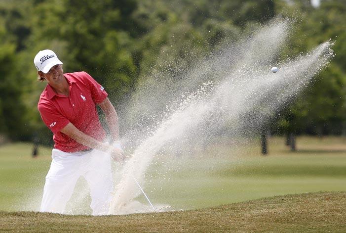 Webb Simpson hits out of a bunker on the sixth hole on Sunday during the final round of the Zurich Classic golf tournament in New Orleans.