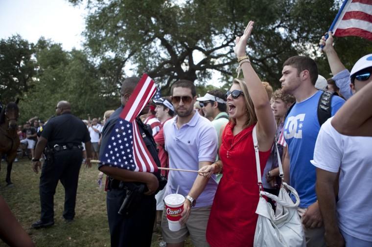 Angry crowd swarms for scheduled flag burning