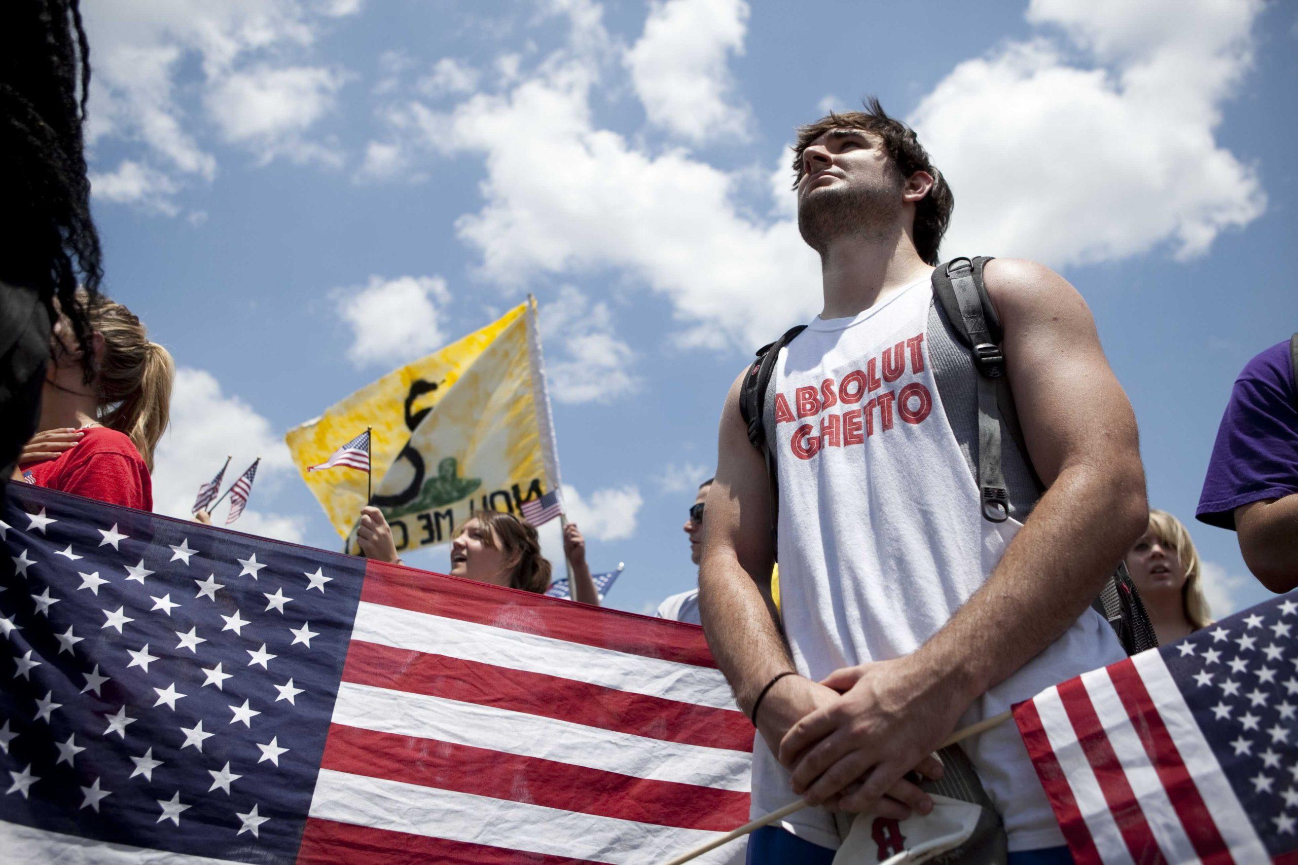 Angry crowd swarms for scheduled flag burning