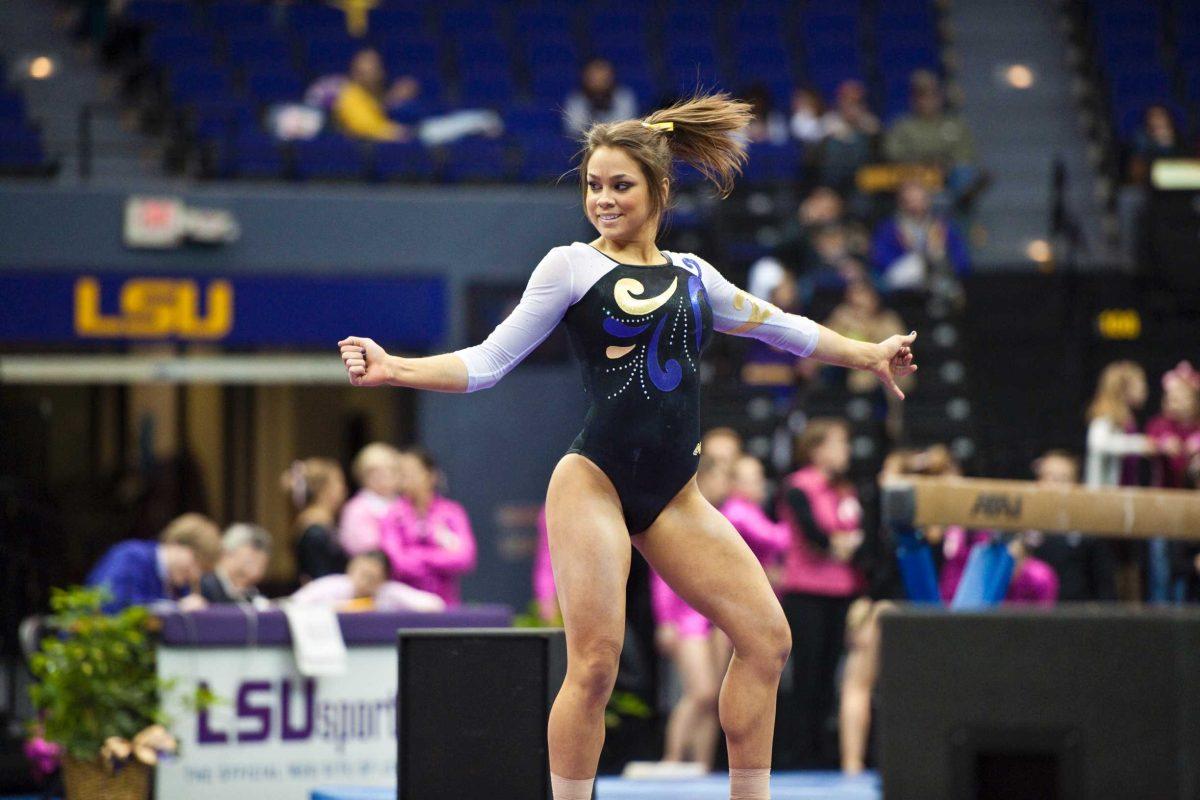 Rising junior gymnast Janelle Garcia performs on the floor in the Etta James Memorial meet against Georgia at the PMAC on Feb. 18.