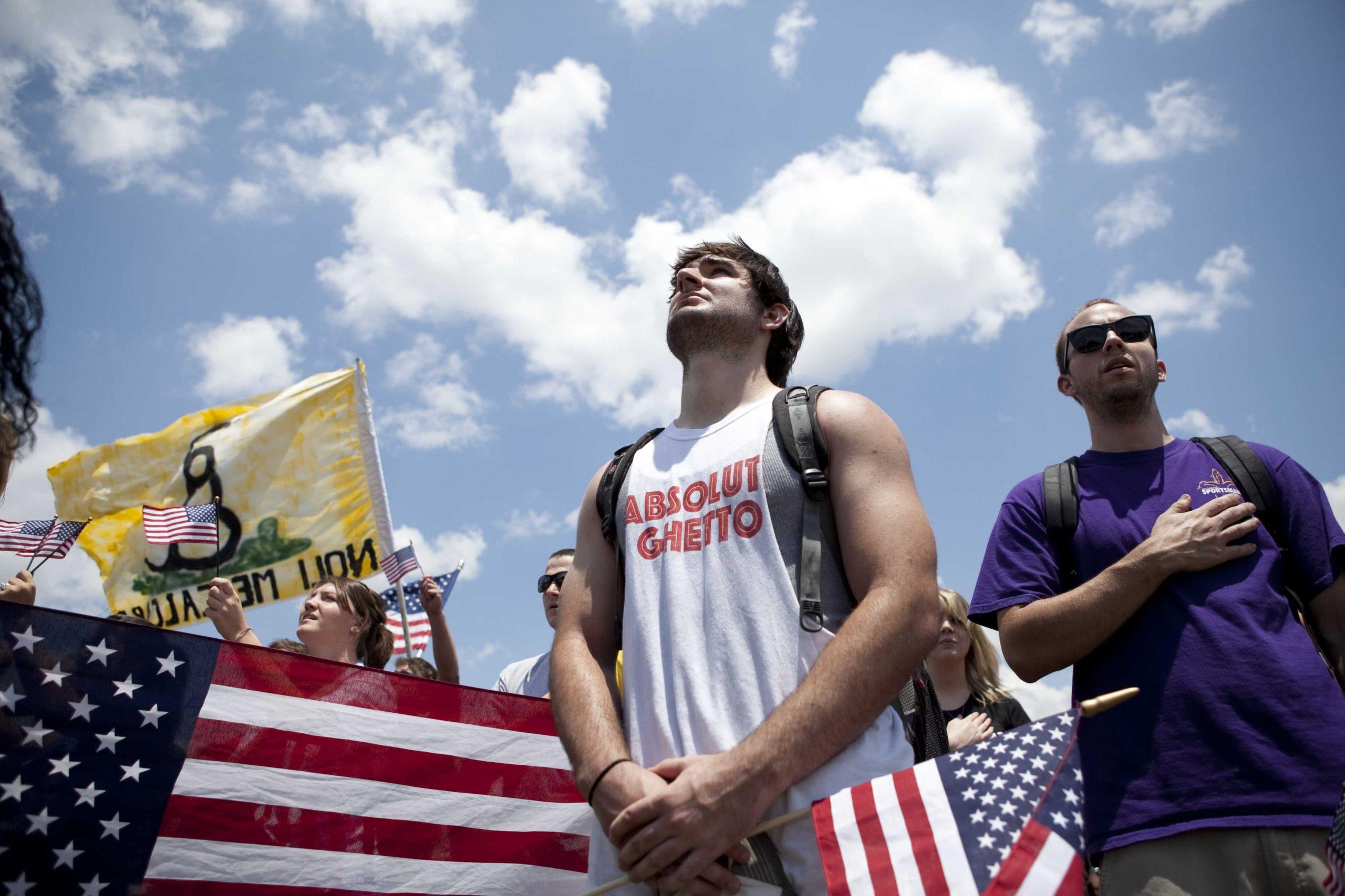 Angry crowd swarms for scheduled flag burning