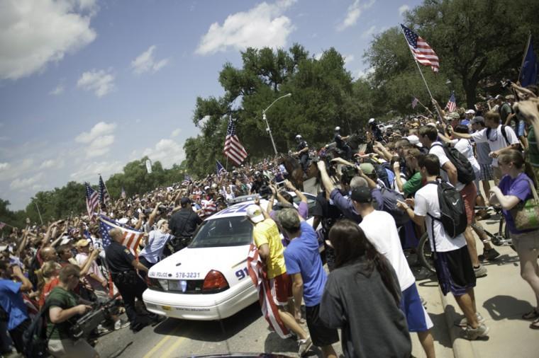 Angry crowd swarms for scheduled flag burning