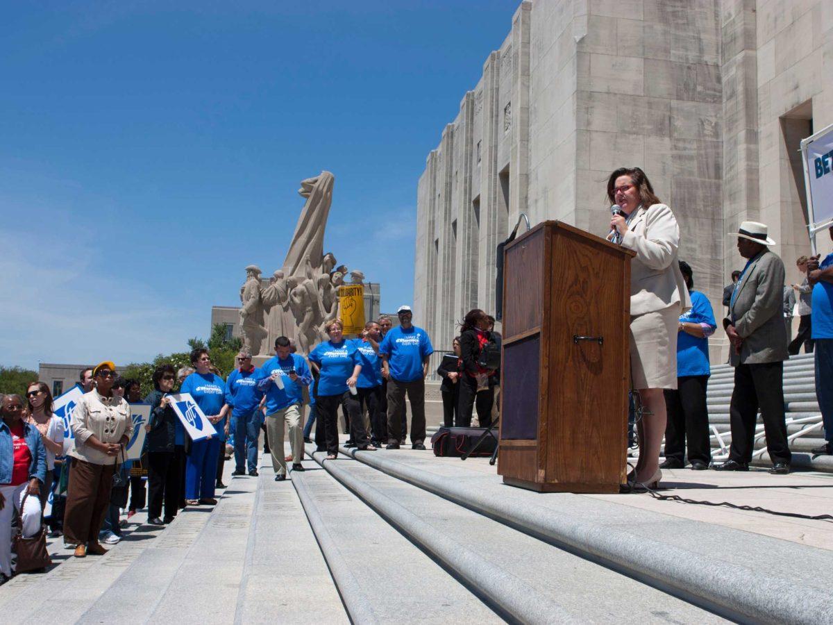 A diverse group of about 200 state employees was joined Wednesday by a handful of university students on the steps of the Capitol to protest cuts to various state programs.