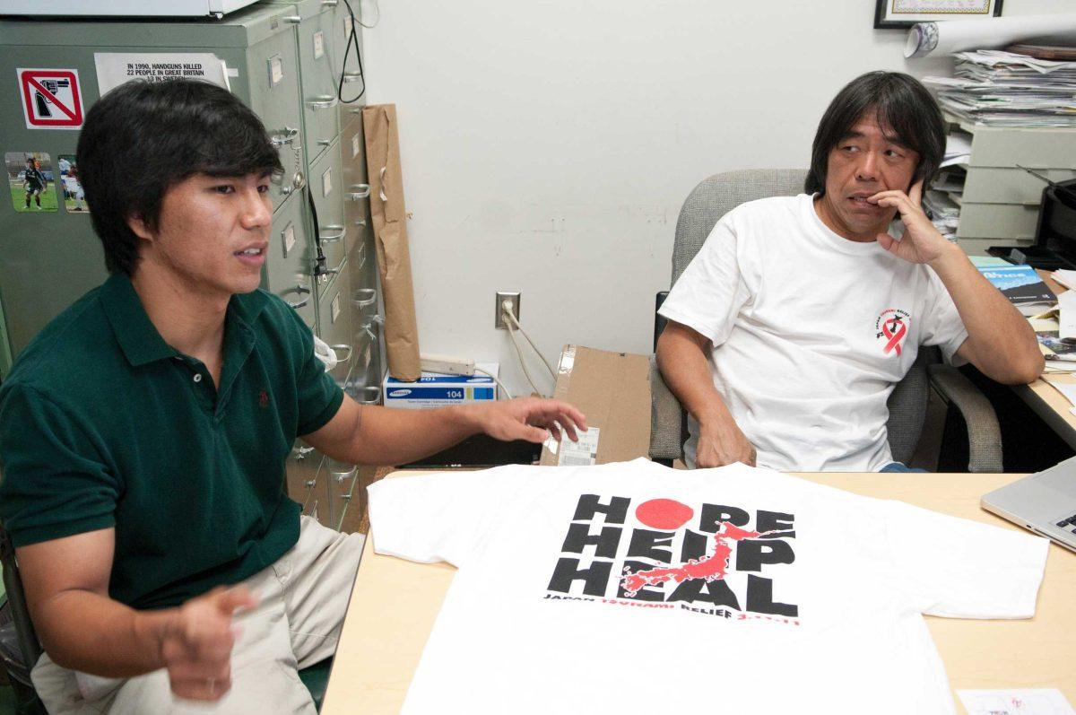 Sociology professor Yoshinori Kamo, right, and his son Kenta Kamo, international trade and finance sophomore, speak April 11 about the Hope for Japan charity they started.