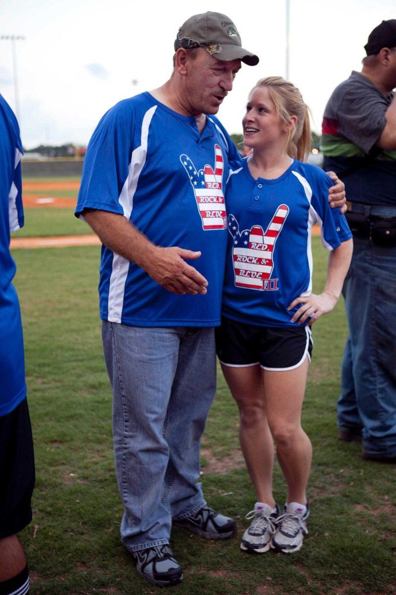 Troy Landry of the reality TV show &#8220;Swamp People&#8221; chats with LSU gymnast Susan Jackson before participating in the Celebrity/Sorta Celebrity softball game Friday.