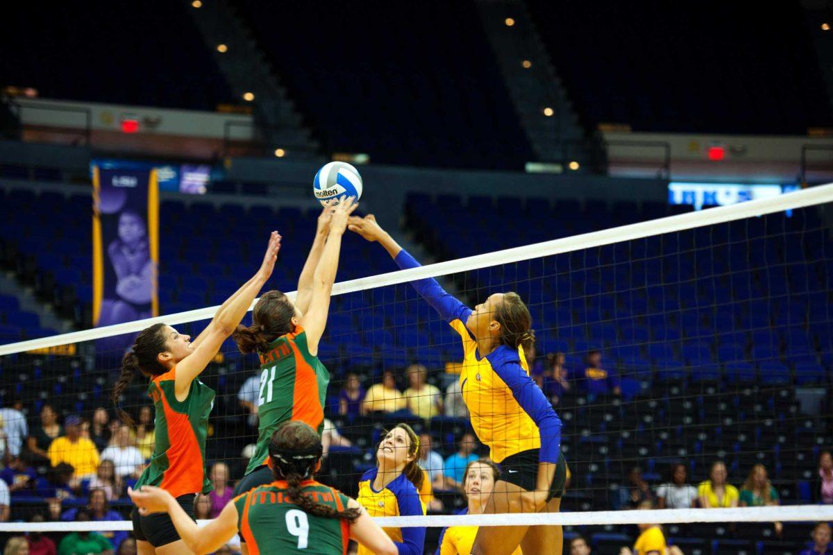 LSU sophomore middle blocker Desiree Elliott goes up for the tip against Miami on Saturday in the PMAC. The Tigers fell to the Hurricanes, 3-2, in a five-set showdown.