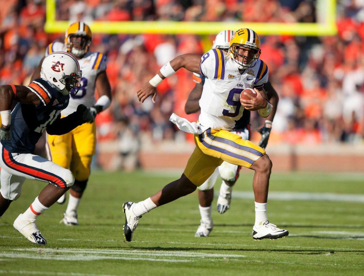 Senior QB Jordan Jefferson scrambles against Auburn defense on Oct. 23.