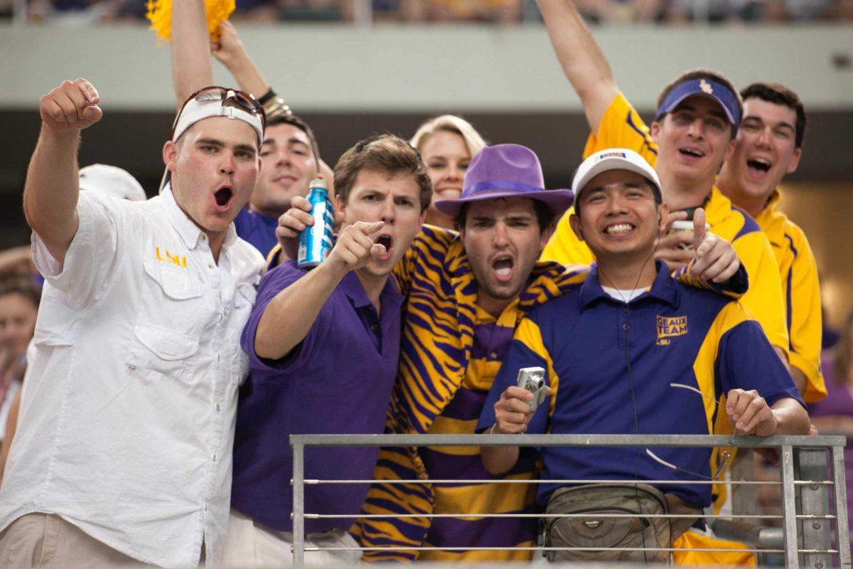 Fans cheer for the Tigers on Sept. 3 during LSU&#8217;s win against Oregon in Cowboy Stadium.