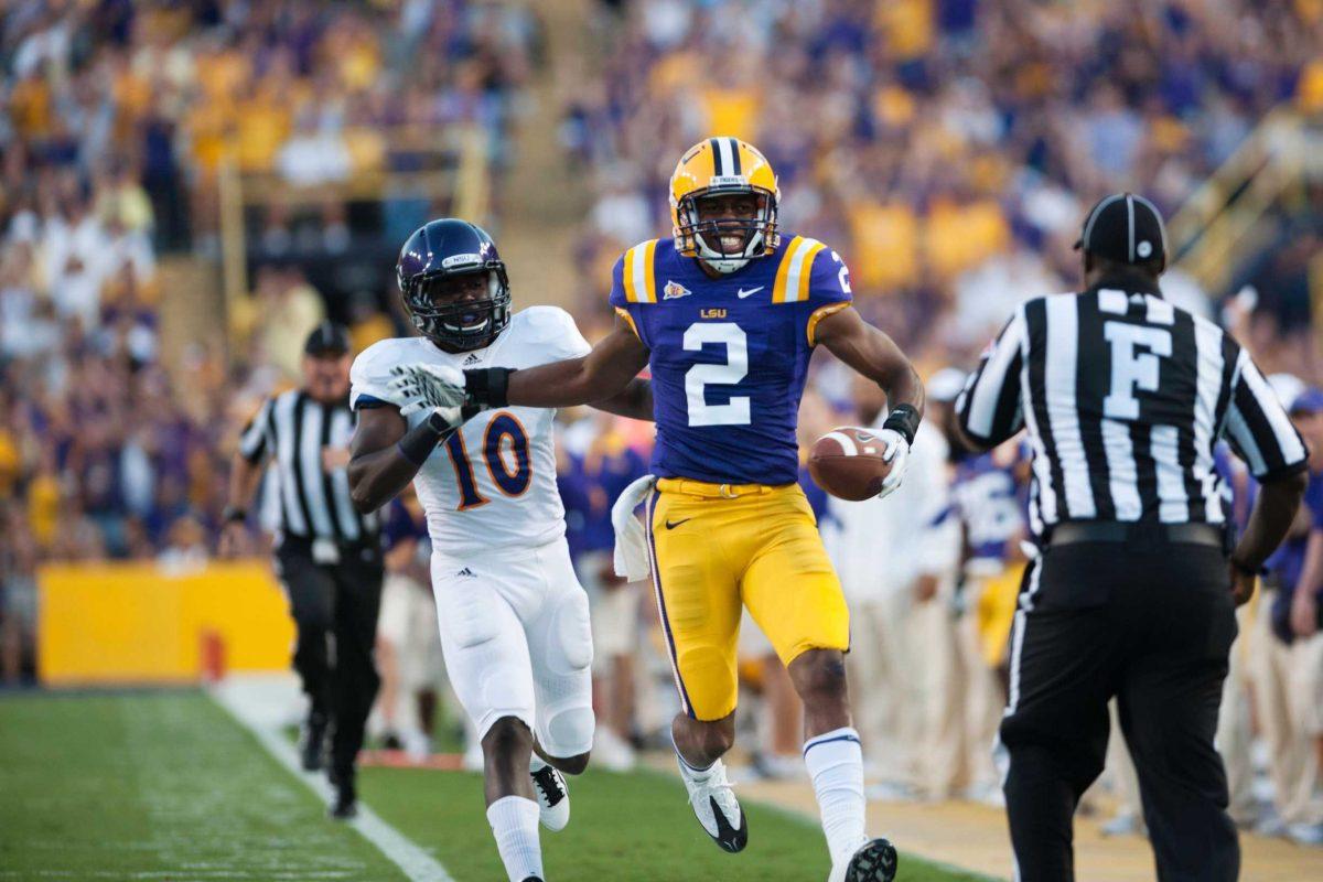 LSU junior wide receiver Rueben Randle evades a Northwestern State defender Saturday during the Tigers&#8217; 49-3 win against the Demons.