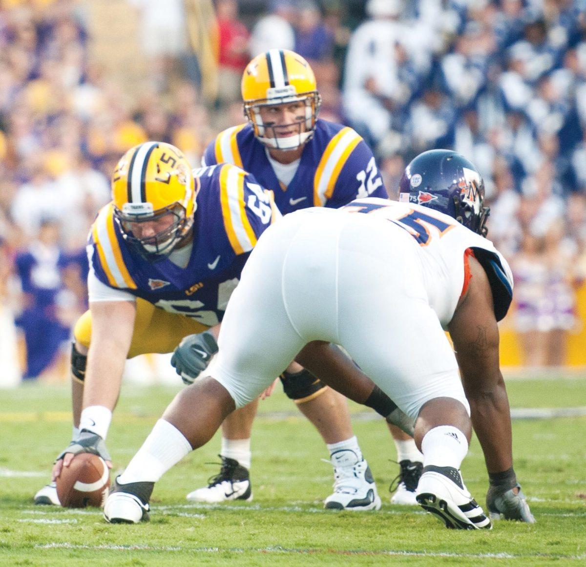 LSU senior quarterback Jarrett Lee (12) lines up under center against Northwestern State on Saturday. The Tigers will face off against Mississippi State tonight in Starkville, Miss.