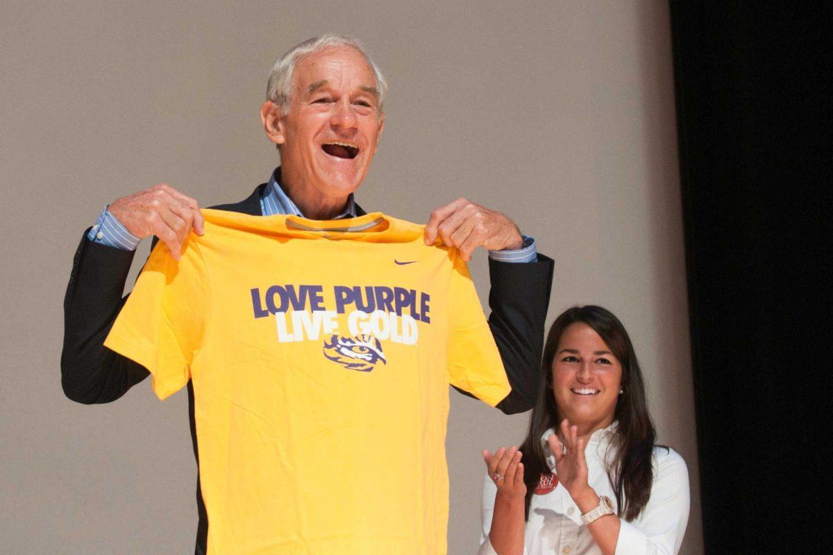 GOP presidential candidate Ron Paul shows off an LSU shirt Friday after beginning his national Youth for Ron Paul movement in the Union Theater.