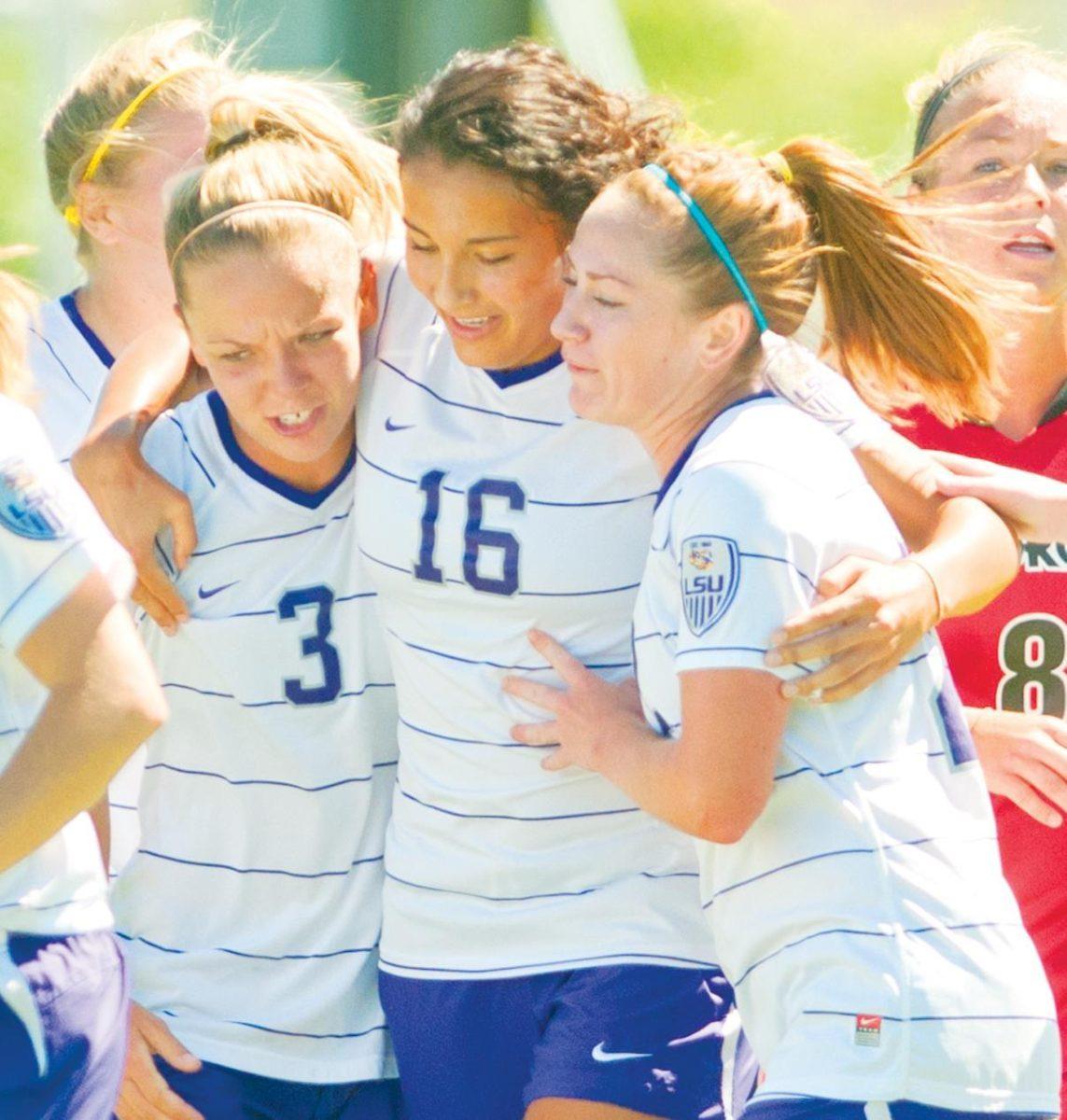 Members of the LSU soccer team celebrate Oct. 2 after senior midfielder Taryne Boudreau (16) scored the second goal of the Tigers&#8217; 2-1 win over Georgia.