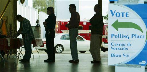 In this Jan. 29, 2008 file photo, voters line up at a polling station to vote in Florida's presidential primary in Coral Gables, Fla. A Florida commission is expected to announce Friday, Sept. 30, 2011, that its presidential primary will be held Jan. 31, according to Florida House Speaker Dean Cannon, though GOP officials from other states are lobbying Florida to reconsider.