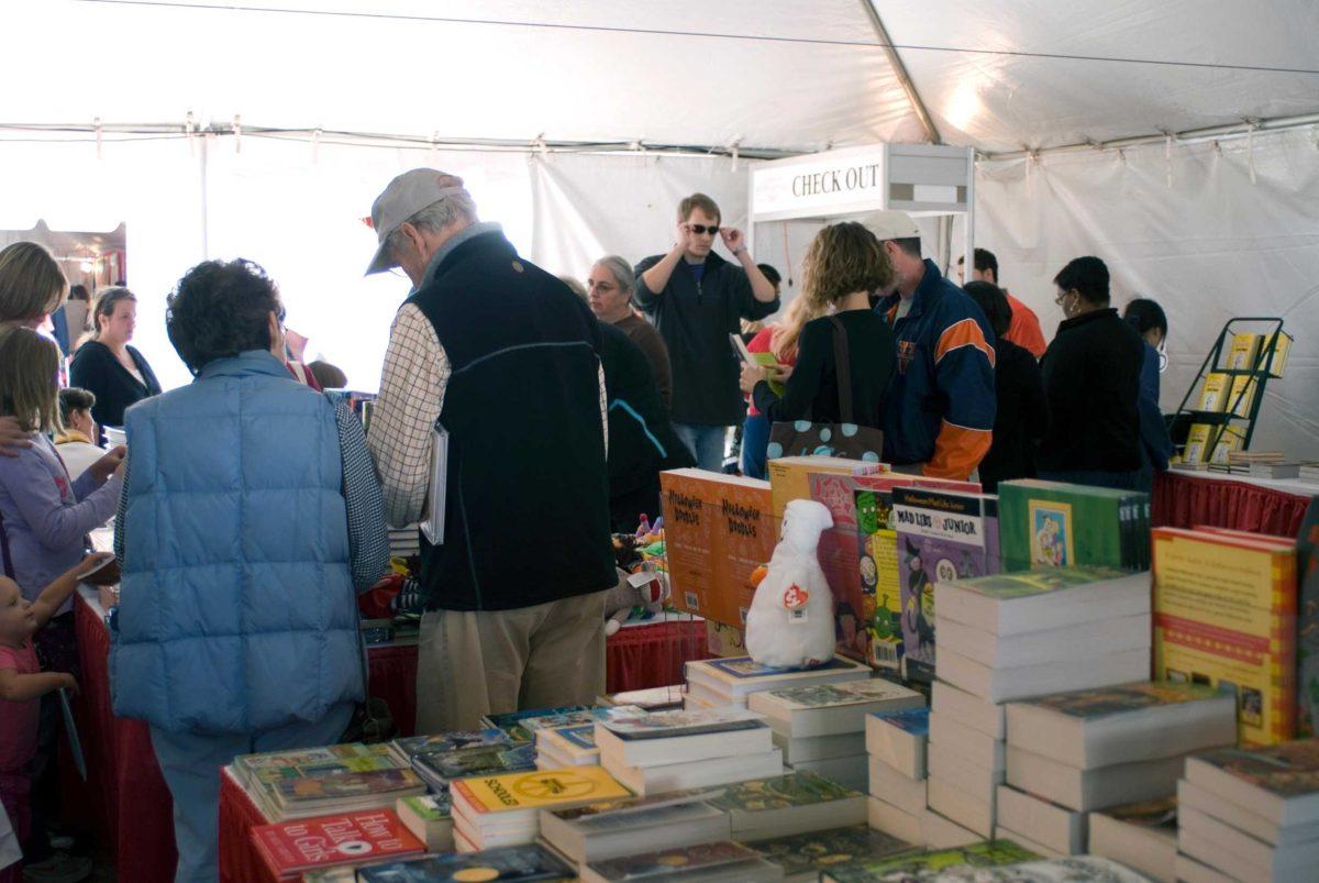 Festival-goers check out a children&#8217;s books tent Oct. 17, 2009, at the Louisiana Book Festival held in front of the Louisiana State Capitol.