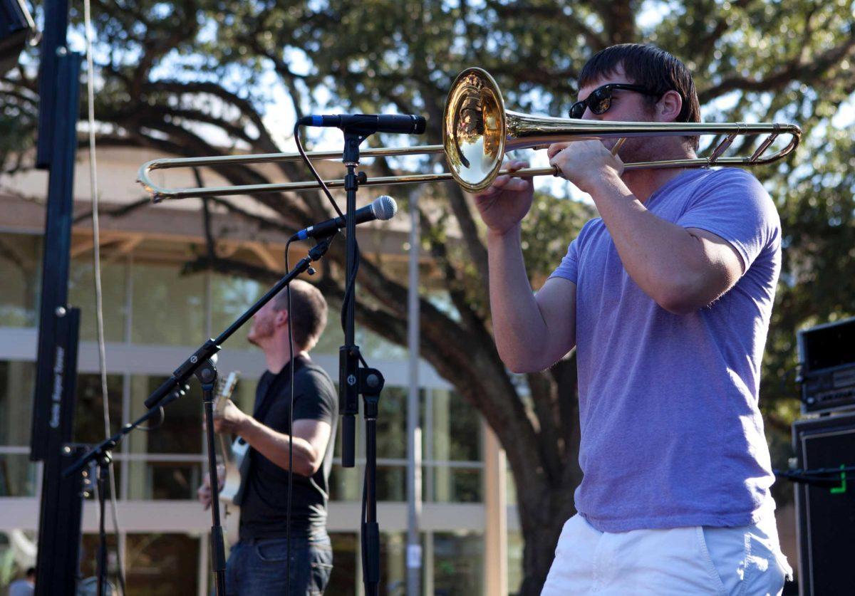 Members of Hazy Ray perform in the Battle of the Bands in Free Speech Plaza after Saturday&#8217;s game.