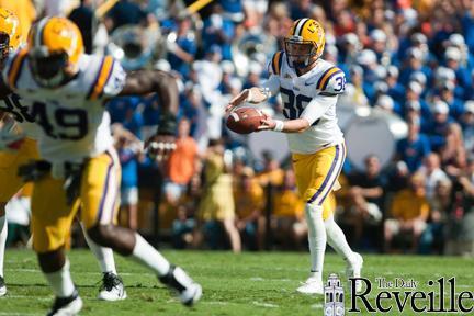 In this October 8, 2011 file photo, Punter Brad Wing kicks the ball away against the Florida Gators.