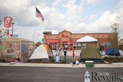 People have lined up thier tents outside of the new Chick-fil-A on College Drive to camp out for the stores opening on Thursday morning. Chick-fil-A will be handing out prizes to the first 100 people through the door after it opens.