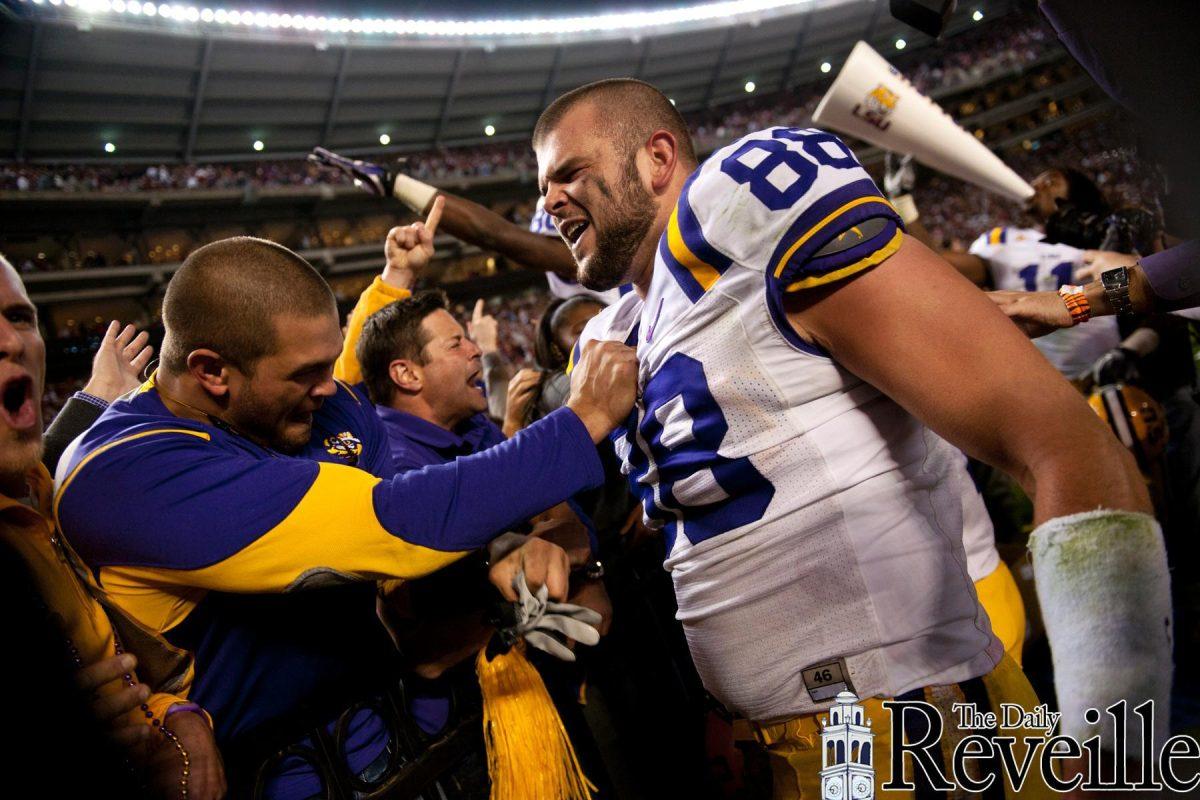 LSU students dance along with Tiger Band on Saturday during the Tigers&#8217; 9-6 overtime victory against Alabama in Bryant-Denny Stadium in Tuscaloosa, Ala.