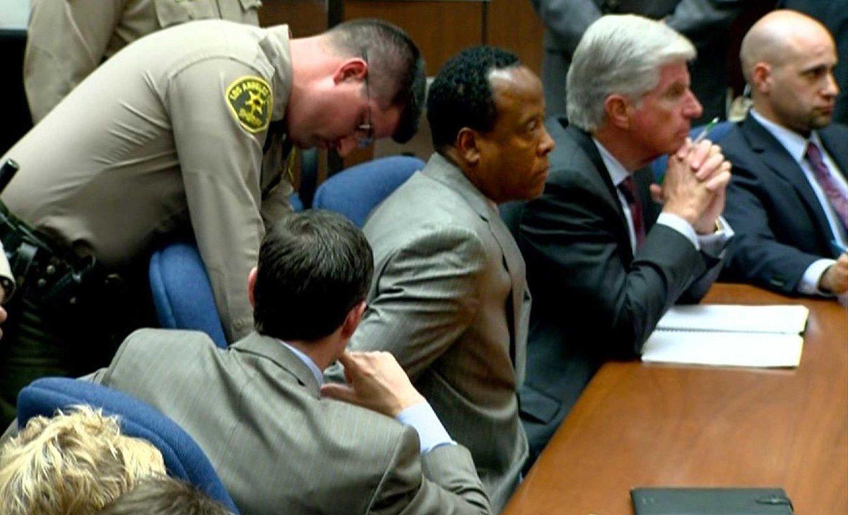 In this framegrab made from a courtroom television pool feed, Dr. Conrad Murray is remanded into custody after the jury returned with a guilty verdict in his involuntary manslaughter trial, Monday, Nov. 7, 2011 in a Los Angeles. Murray was convicted Monday of involuntary manslaughter after a trial that painted him as a reckless caregiver who administered a lethal dose of a powerful anesthetic that killed the pop star.