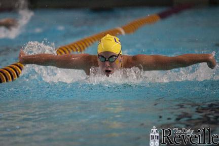 Junior Sara Haley comes up for air during the 200-meter fly in Friday&#8217;s meet against Alabama in the LSU Natatorium.