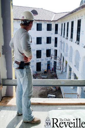 Courtland Foley looks over the courtyard of the new Residential College North on Wednesday afternoon. The residential college is scheduled to open fall 2012.