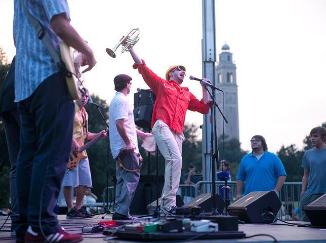 K.C. O&#8217;Rorke, from the band 'Flow Tribe', sings Thursday on the parade grounds. The Back to School C