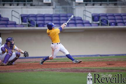 LSU junior infielder Mason Katz swings at the ball Monday during a scrimmage in Alex Box Stadium. The scrimmage ended in a 1-1 tie.