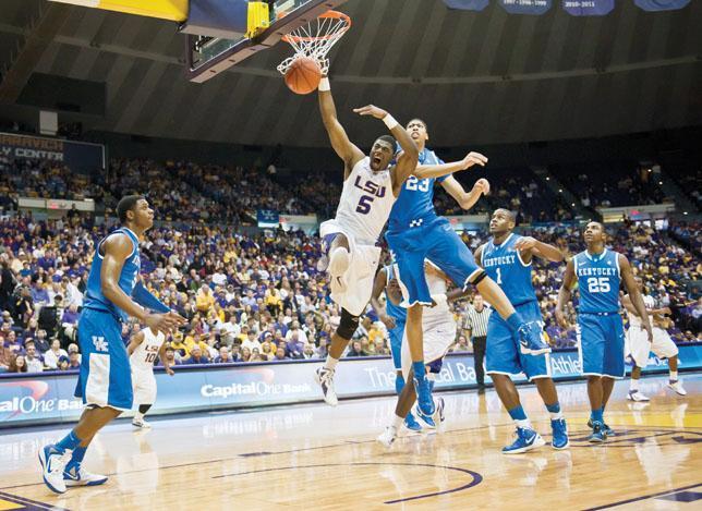 Freshman Kentucky forward Anthony Davis (23) swats a layup attempt from LSU senior forward Malcolm White (5) on Saturday during LSU&#8217;s 74-50 loss at the PMAC.