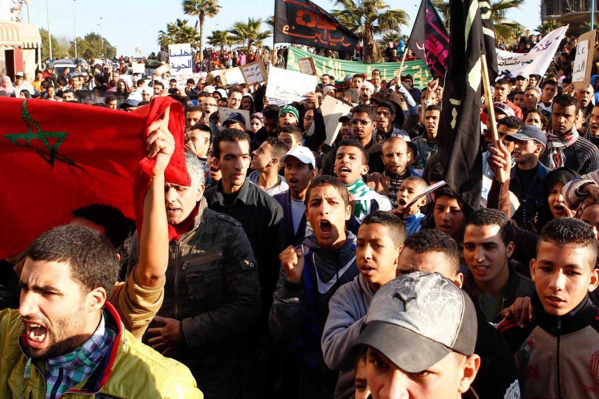 Pro-democracy protesters march through a lower income neighborhood in Casablanca, Morocco, on Sunday denouncing the newly elected government and the king. Morocco is among the nations to soon receive free mobile access to Wikipedia.