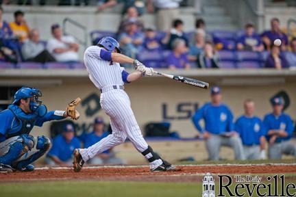 LSU senior utility player Grant Dozar (7) swings for a base hit Wednesday in the Tigers&#8217; 11-4 victory against McNeese State.