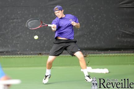 LSU senior tennis player Neal Skupski hits the ball Feb. 2 during the Tigers&#8217; match against Clemson University at &#8216;Dub&#8217; Robinson Stadium.