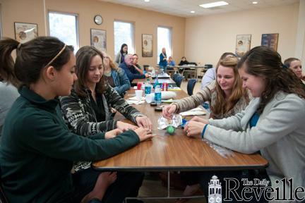 Elementary education students work on a hands-on project Saturday morning at the NASA K-12 Educator Professional Development Workshop in Peabody Hall.