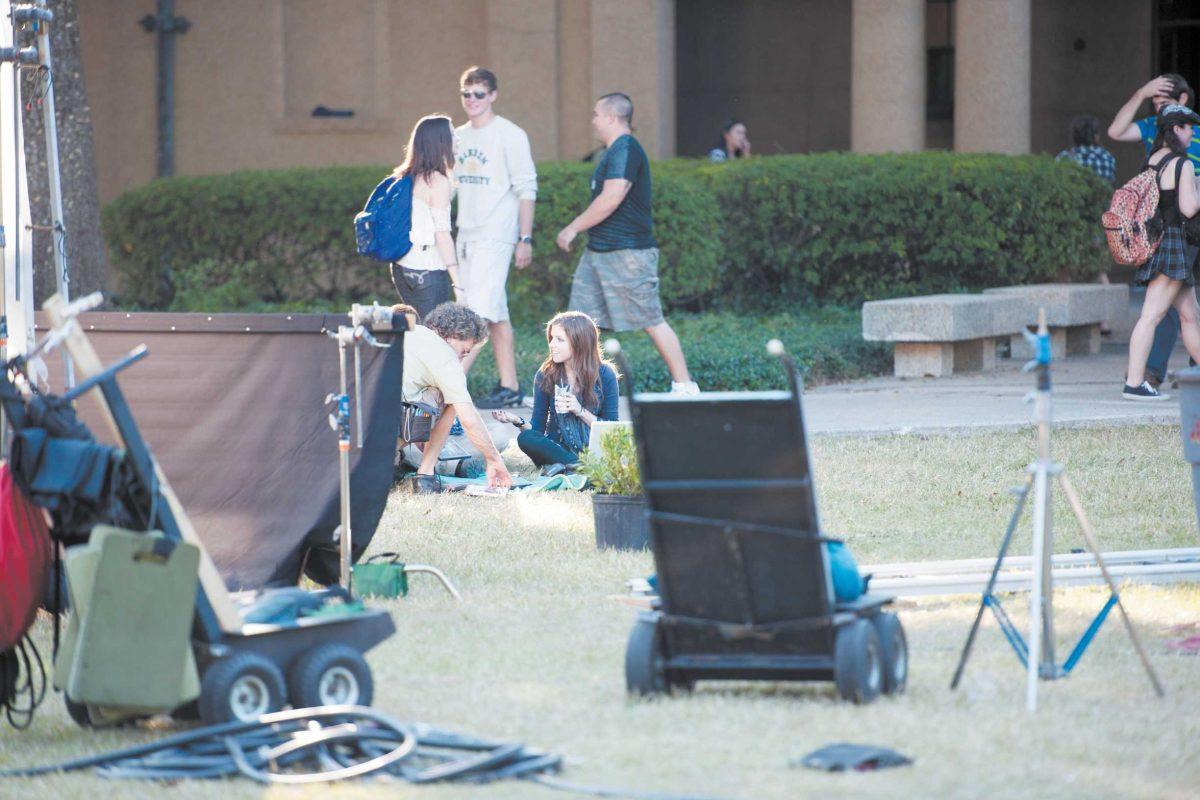 Students participate as extras Oct. 24, 2011, during the filming of &#8220;Pitch Perfect,&#8221; starring Anna Kendrick (above). Portions of the movie were filmed in the Quad and other spots around campus.