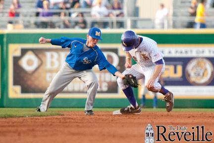 LSU first baseman Mason Katz (8) beats a tag Wednesday in the Tigers&#8217; 11-4 victory against McNeese State.