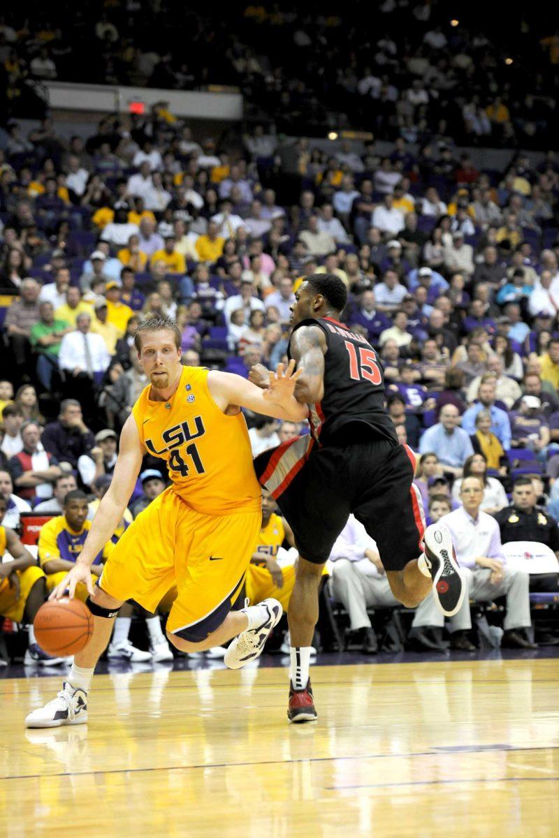 LSU junior center Justin Hamilton drives the ball down the court Feb. 22 during the Tigers&#8217; 61-53 win against Georgia in the PMAC.