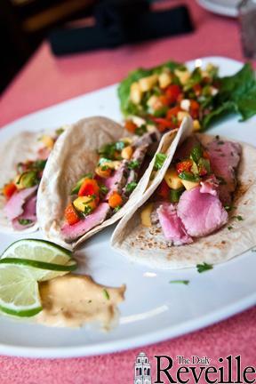 Seared ahi tuna tacos with pico de gallo and mango sauce, priced at $14.99, are plated at Aztecas Mexican Cuisine&#8217;s recently-opened downtown location.