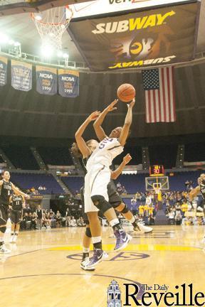 LSU senior forward LaSondra Barrett grabs a rebound Thursday during the Tigers&#8217; victory against the Commodores in the PMAC.