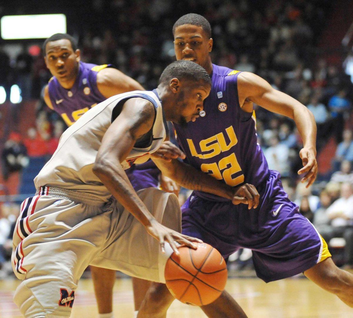 Ole Miss senior forward Terrance Henry (1) works against LSU sophomore guard Ralston Turner (22) on Saturday during the Tigers&#8217; 72-48 loss in Oxford, Miss.