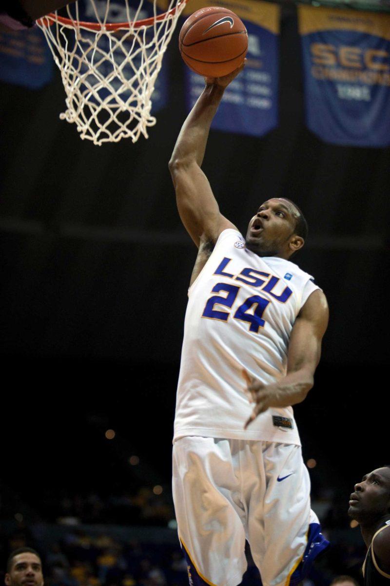 Then- junior forward Storm Warren (24) makes a slam dunk during the Tigers' 90-69 loss to Vanderbilt Saturday, Feb. 26, 2011, at the PMAC.