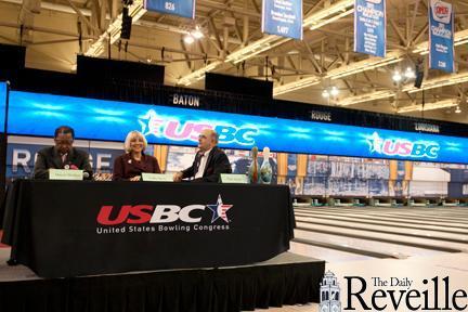 Mayor-President Kip Holden (left), Office of Lieutenant Governor Chief of Staff Cathy Berry (middle) and Visit Baton Rouge Convention and Visitors Bureau President &amp; CEO Paul Arrigo (right) announce the start of the 2012 USBC Championship on Wednesday.