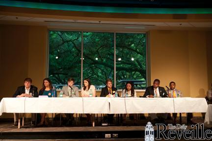 Candidates for Student Government president and vice president answer questions Thursday night about various topics like student involvement during the SG debate in the Student Union&#8217;s Live Oak Lounge. Elections are March 26 and 27.