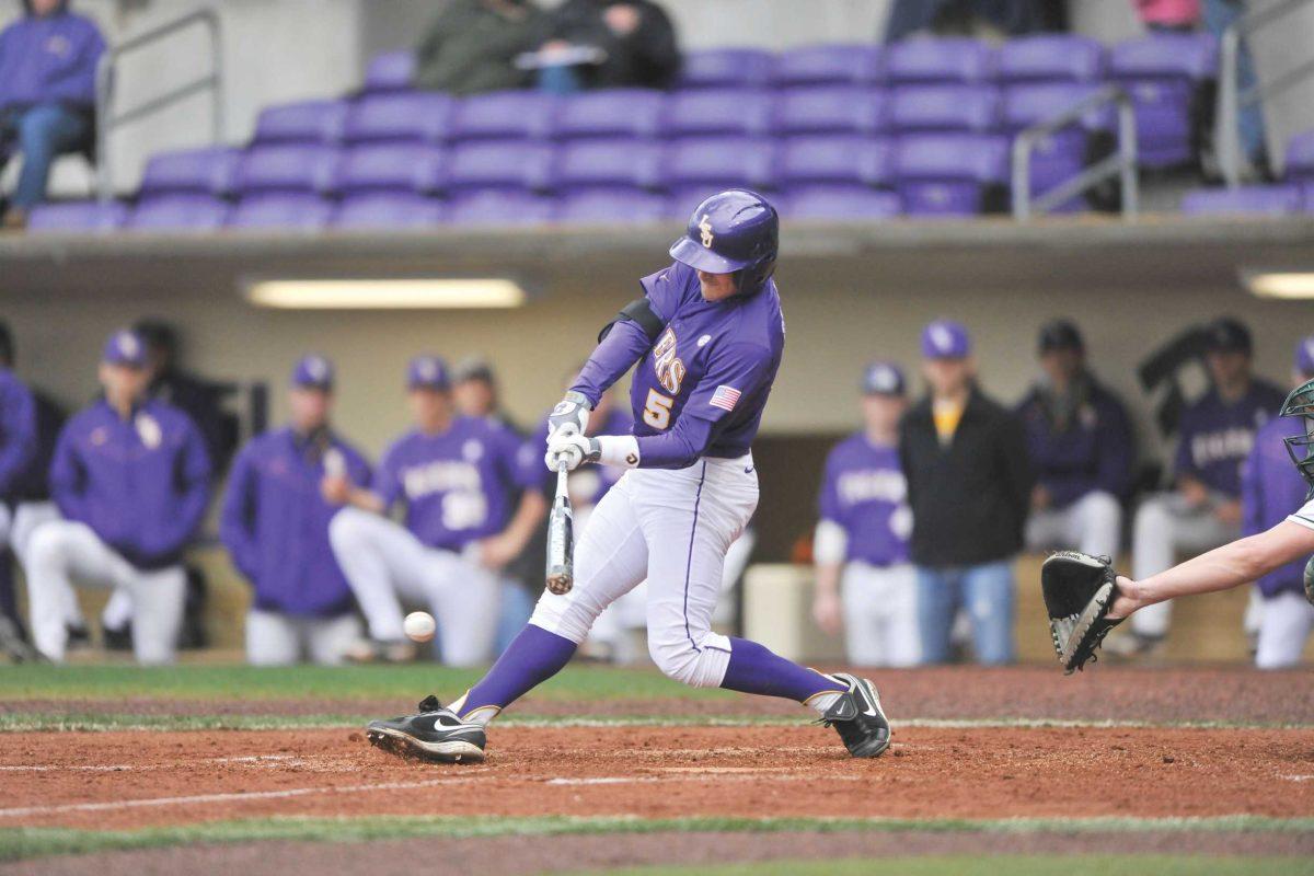 LSU freshman outfielder Chris Sciambra swings for a base hit.