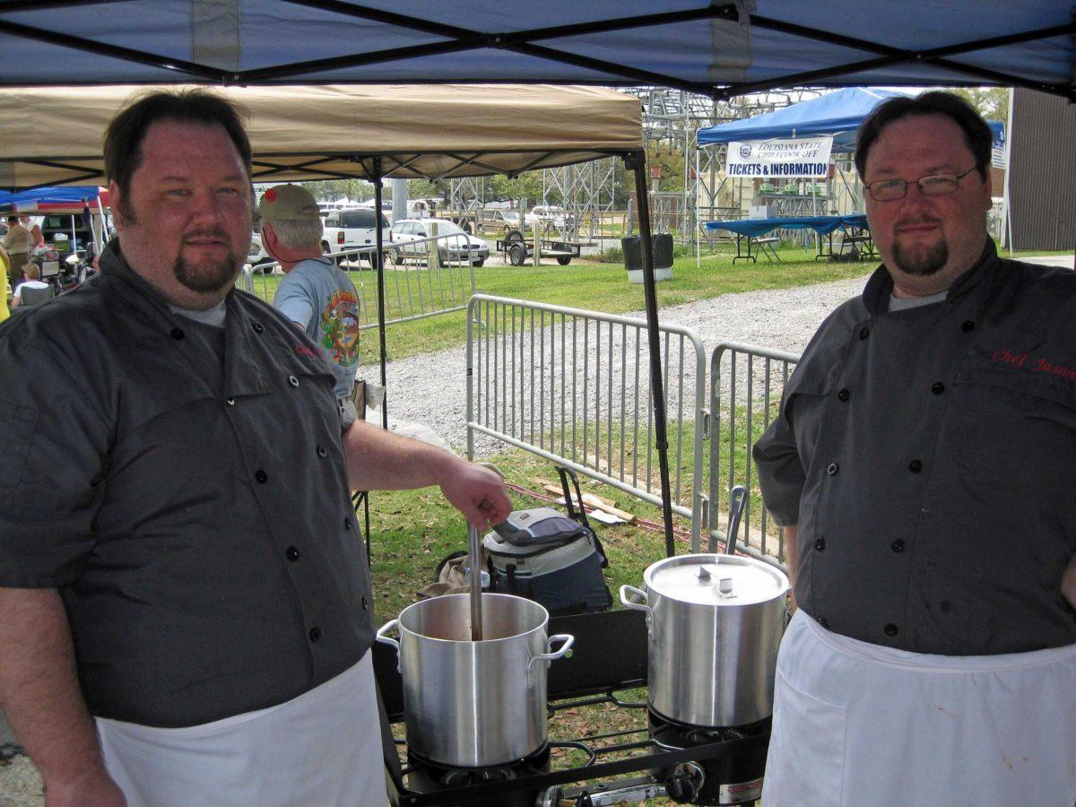 Jason and Eric Blevins, The Bayou Brothers, stand next to their prize-winning chili at the 2011 Louisiana State Chili Cook-Off.