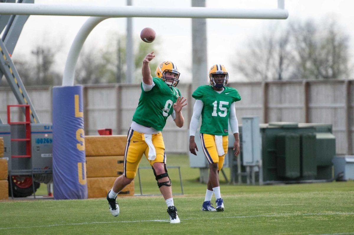 LSU junior quarterback Zach Mettenberger throws a pass Tuesday at football practice.